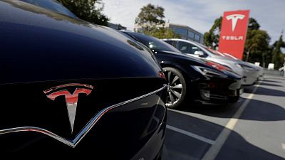 Tesla cuts China car prices to absorb hit from trade war tariffs Tesla cuts China car prices to absorb hit from trade war tariffs