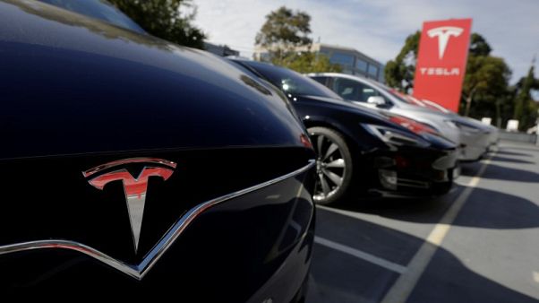 Tesla cuts China car prices to absorb hit from trade war tariffs Tesla cuts China car prices to absorb hit from trade war tariffs