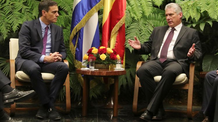 Spanish PM agrees closer ties with Cuba during historic visit