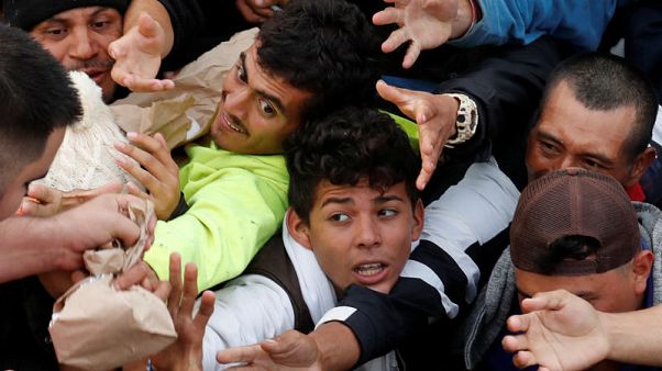 Tensions rise at U.S.-Mexico border as migrants, holiday travellers wait to cross Tensions rise at U.S.-Mexico border as migrants, holiday travellers wait to cross