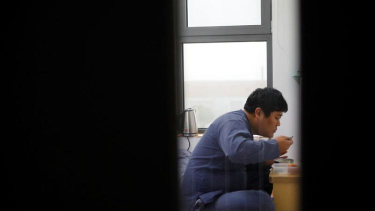 South Koreans lock themselves up to escape prison of daily life