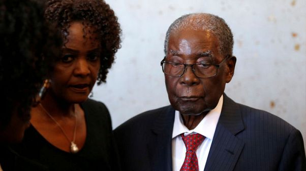 Zimbabwe's Mugabe in Singapore for medical treatment, unable to walk Zimbabwe's Mugabe in Singapore for medical treatment, unable to walk