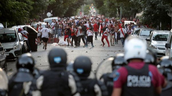 Libertadores final postponed after Boca bus attacked, players hurt Libertadores final postponed after Boca bus attacked, players hurt