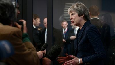 Accord sur le Brexit: la persévérance de Theresa May a payé