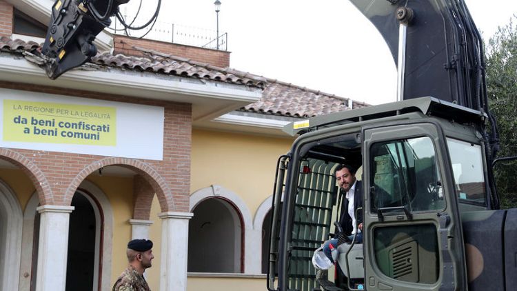 Italy's interior minister leads demolition of mafia villa