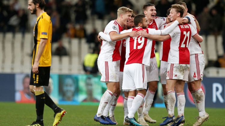 Tadic double sends Ajax into Champions League last 16