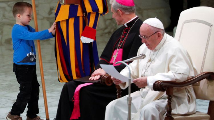 'Unruly' young boy upstages Pope Francis