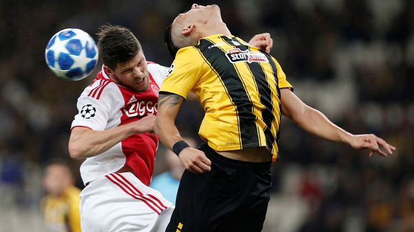 AEK, Ajax charged by UEFA over Champions League crowd trouble AEK, Ajax charged by UEFA over Champions League crowd trouble