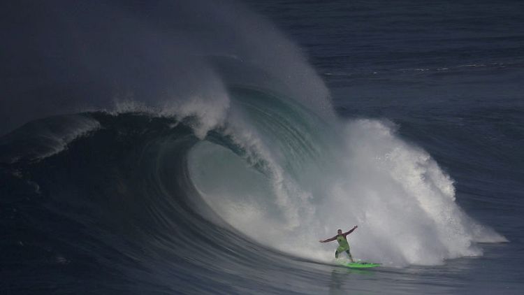 Surf legend McNamara to clean up ocean that gave him fame