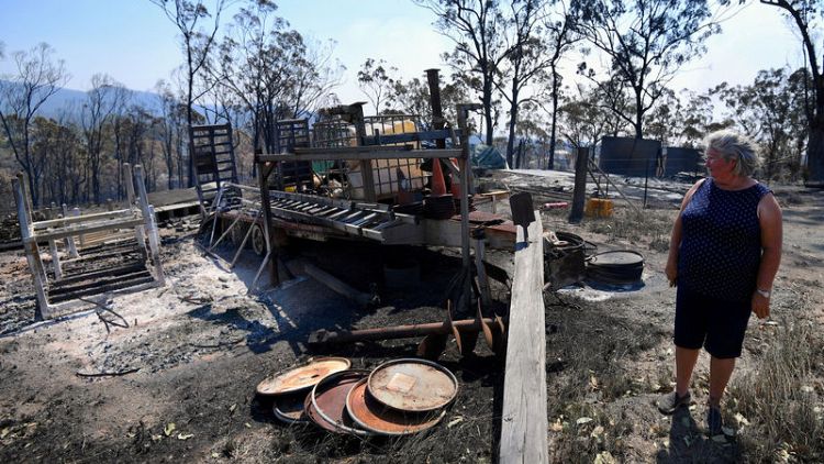 Australia, facing extreme weather, gains upper hand on more than 100 bushfires
