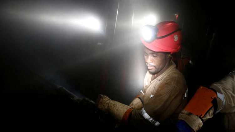 Lonmin posts full year profit, compared to year-ago loss; warns on Sibanye deal closing