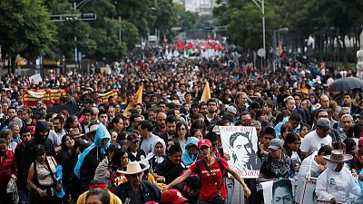 Mexico rights agency slams missing student probe, cites 19 burnt remains found Mexico rights agency slams missing student probe, cites 19 burnt remains found