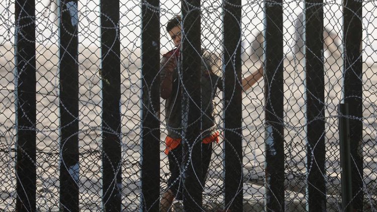 Handful of caravan migrants launch hunger strike at U.S border