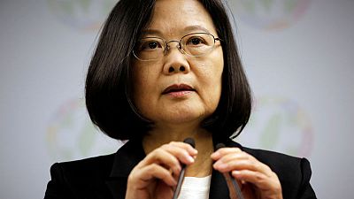 Taiwan president says 'status quo' policy on China won't change after election drubbing Taiwan president says 'status quo' policy on China won't change after election drubbing