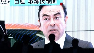 Le portrait de Carlos Ghosn sur écran géant à Tokyo, le 20 novembre 2018