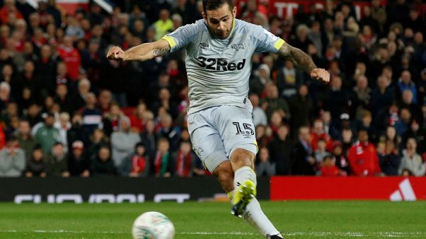 Derby's Johnson hit with FA charge over 'biting' incident Derby's Johnson hit with FA charge over 'biting' incident