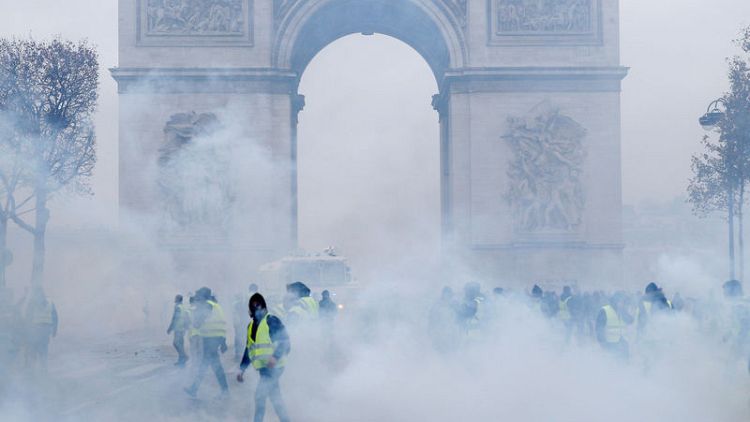 'State of insurrection' as fuel tax riots engulf central Paris