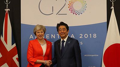 Japan's Abe urges UK PM May to avoid 'no deal' Brexit