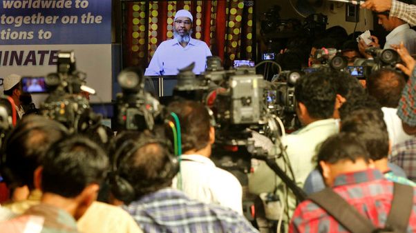 Wanted in India, fiery Islamic preacher says he has not broken any law Wanted in India, fiery Islamic preacher says he has not broken any law