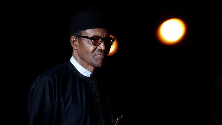 Nigeria's Buhari denies dying and being replaced by lookalike