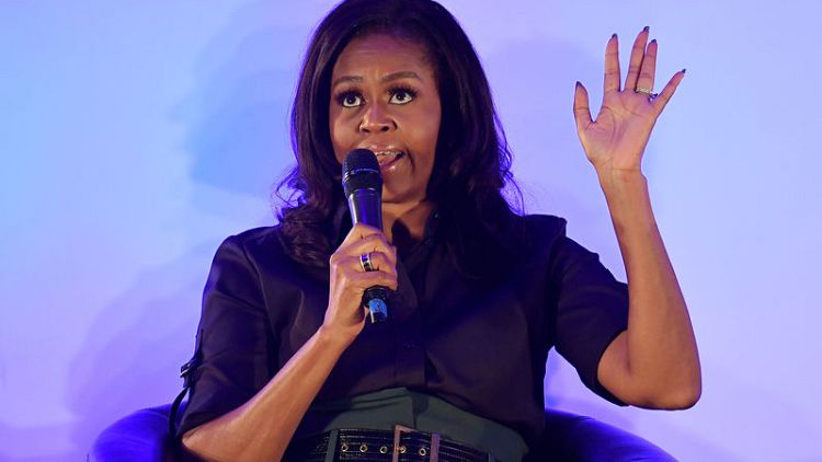 Michelle Obama revisits London school that inspired education drive