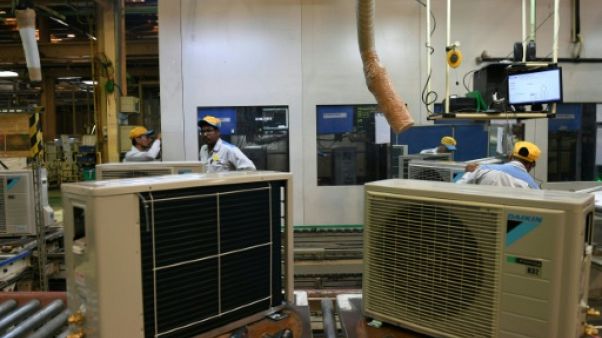 Froid dedans, plus chaud dehors: l'Inde dans le cercle vicieux des climatiseurs Froid dedans, plus chaud dehors: l'Inde dans le cercle vicieux des climatiseurs