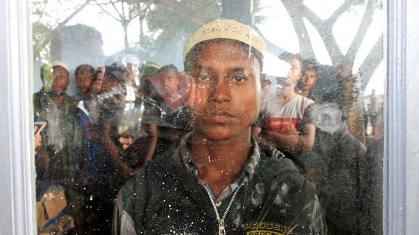 Officials say boat carrying Rohingya Muslims lands in Indonesia Officials say boat carrying Rohingya Muslims lands in Indonesia