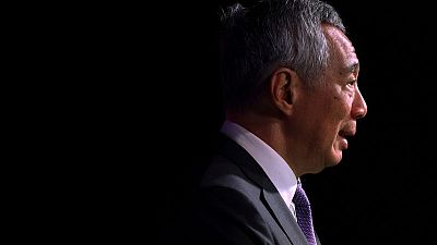 Singapore PM files defamation suit against blogger who shared article on Facebook Singapore PM files defamation suit against blogger who shared article on Facebook