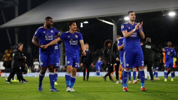 Soccer-Fulham off the bottom after draw with Leicester