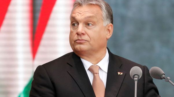 Hungary's Orban exempts pro-government media group from scrutiny Hungary's Orban exempts pro-government media group from scrutiny