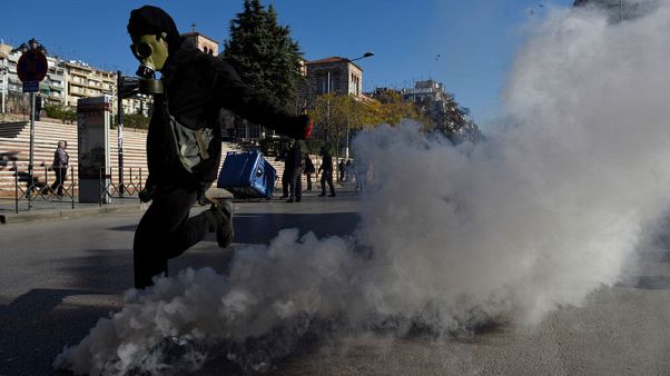 Greek youths march to mark anniversary of police shooting of teenager Greek youths march to mark anniversary of police shooting of teenager