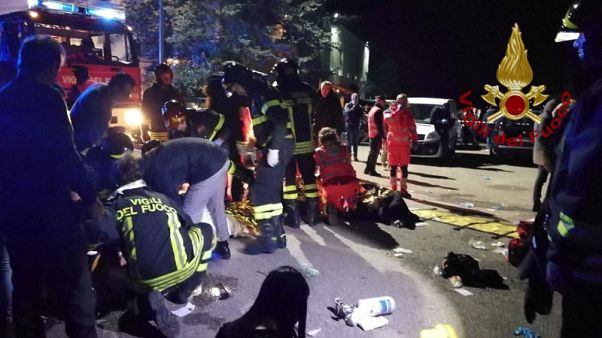 Six people, mostly teenagers, killed in Italy nightclub stampede Six people, mostly teenagers, killed in Italy nightclub stampede
