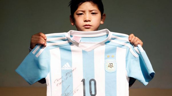Afghan 'Messi boy' forced to flee home Afghan 'Messi boy' forced to flee home