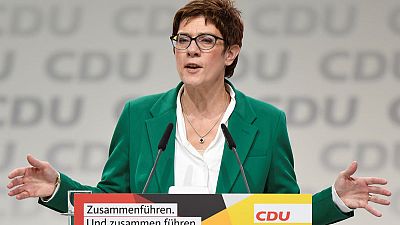 Germany's new CDU chief to review liberal Merkel migration policies Germany's new CDU chief to review liberal Merkel migration policies