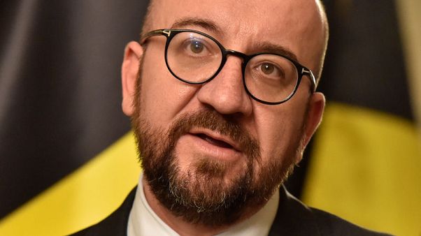 Belgian PM relaunches government as minority after ally quits Belgian PM relaunches government as minority after ally quits