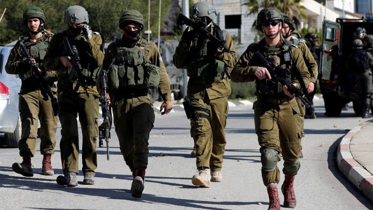 Israeli troops raid Palestinian news agency for footage