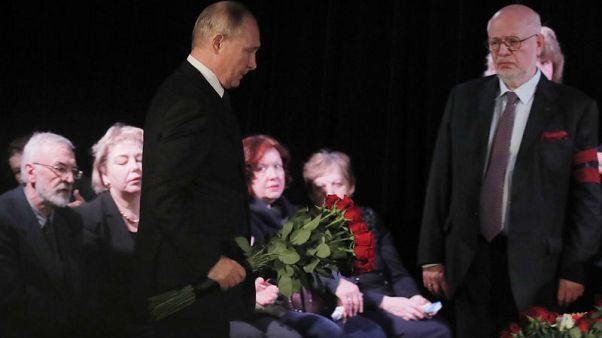 Critics label Putin a hypocrite for attending veteran dissident's wake Critics label Putin a hypocrite for attending veteran dissident's wake