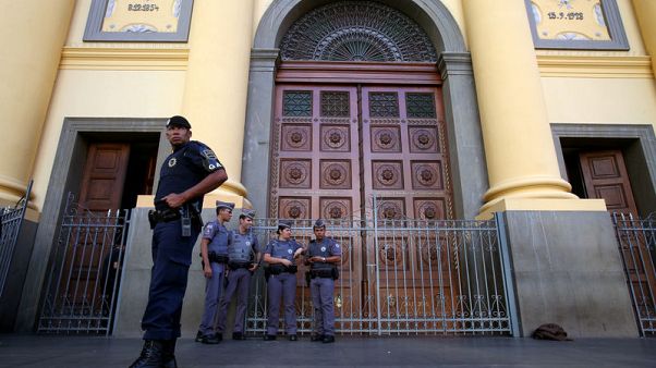 Five dead, four wounded in shooting at Catholic cathedral in Brazil Five dead, four wounded in shooting at Catholic cathedral in Brazil
