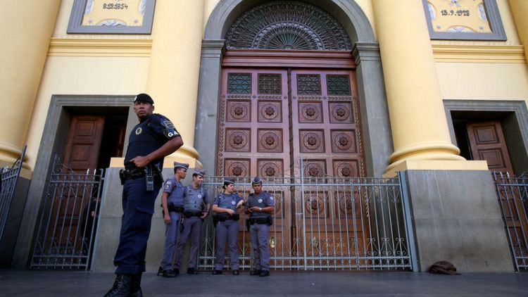 Five dead, four wounded in shooting at Catholic cathedral in Brazil
