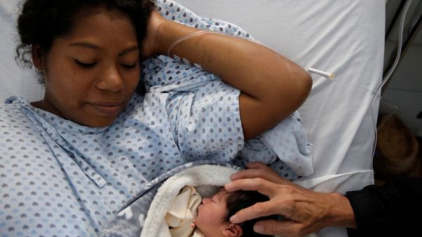 New mother on migrant caravan hopes Trump's heart softens New mother on migrant caravan hopes Trump's heart softens