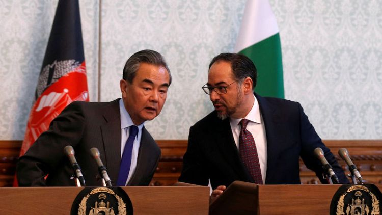 China pledges to help Afghanistan and Pakistan bridge divisions
