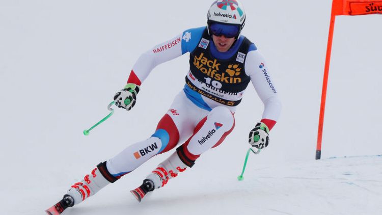 Alpine skiing - Swiss racer Gisin stable after dramatic crash
