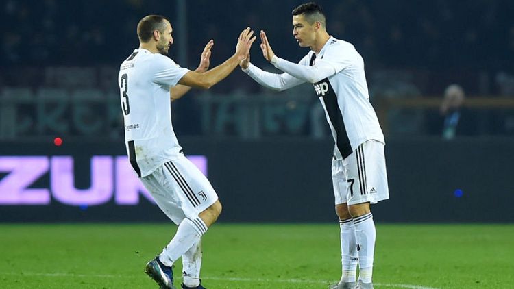 Ronaldo penalty wins Turin derby for relentless Juve