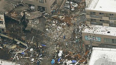 Police, firemen search for cause of explosion in Japan's Sapporo Police, firemen search for cause of explosion in Japan's Sapporo
