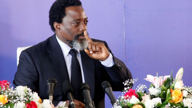 Bowing out as president, Congo's Kabila raises prospect of a return act