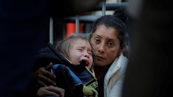 Migrant family who fled tear gas at U.S. border seeks asylum Migrant family who fled tear gas at U.S. border seeks asylum