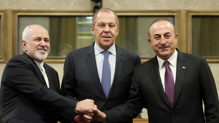 Russia, Iran, Turkey meet, seeking deal on new Syria constitution body