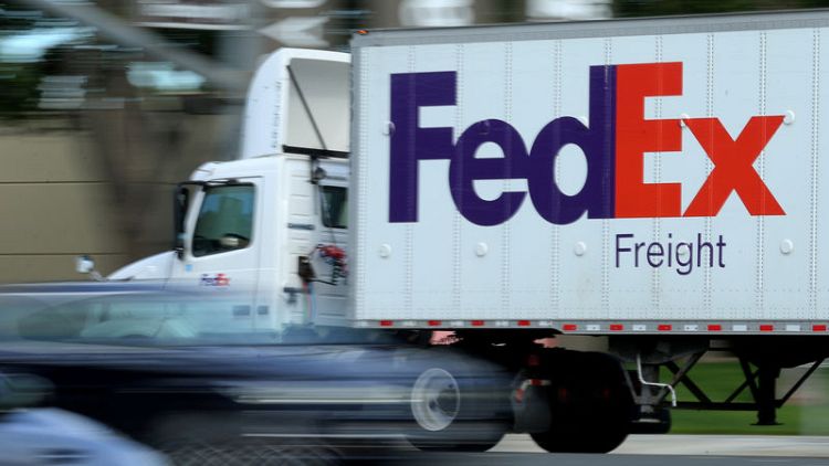 FedEx cuts 2019 view on European softness, global trade cool-down