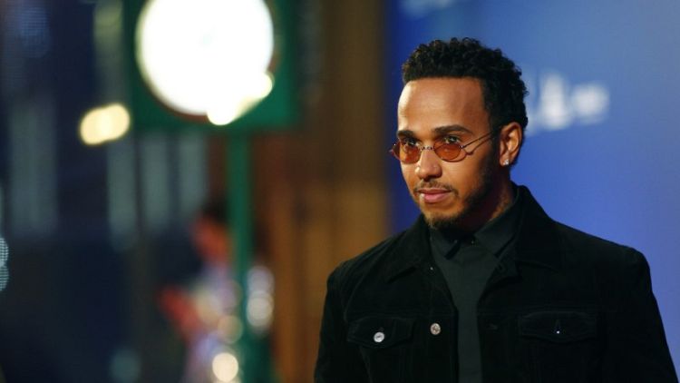 Hamilton says he made a mistake with slum comments