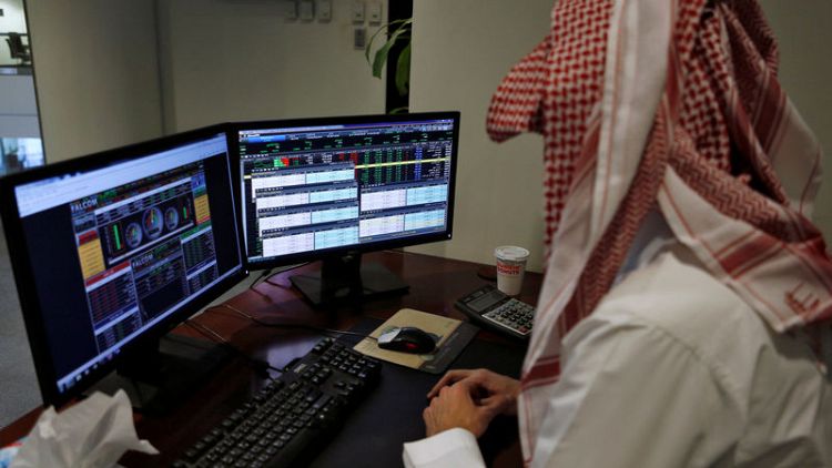 بورصة السعودية تهبط تحت ضغط أسعار النفط والميزانية ودبي تصعد بقيادة البنوك